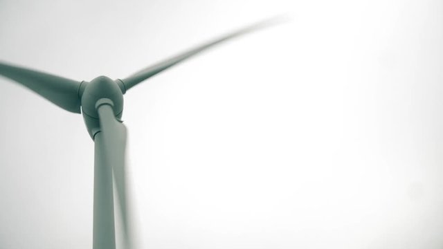 Spinning wind generator, low angle close-up shot