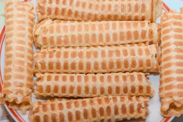 Waffles background. Waffles texture. A lot of waffles on the table. Homemade food. Natural food.