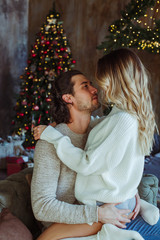 Couple celebrating Christmas at home