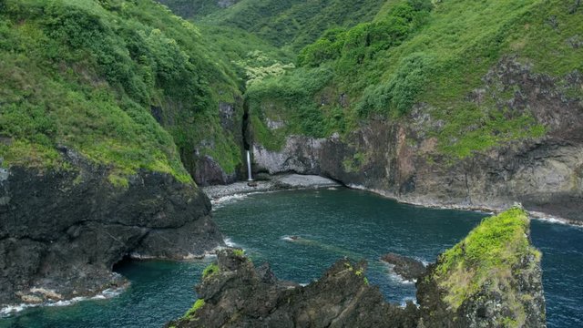 Aerial coastal valley view Molokai volcanic shoreline Hawaii