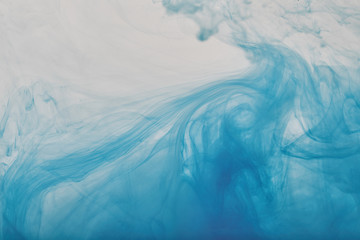 abstract background with blue swirls of paint