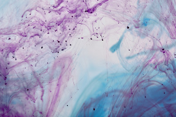 Fototapeta premium abstract texture with purple and blue mixing swirls of paint