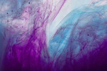 Naklejka premium abstract background with purple and blue mixing swirls of paint