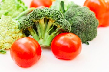 Vegetable variety on wooden white table. Selection of summer and autumn vegetables, space for text