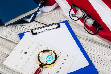 Calendar with july month on american flag. Independence day.