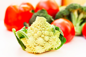 Vegetable variety on wooden white table. Selection of summer and autumn vegetables, space for text