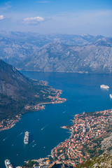 Fototapeta na wymiar Beautiful landscape view of Bay of Kotor in Montenegro with blue cloudy sky