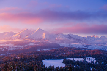 Naklejka premium Snowy mountain summits