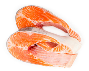 Two pieces of fresh trout on a white, isolated.