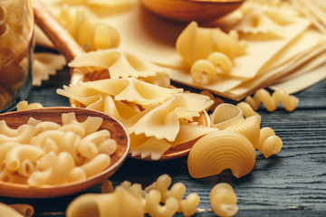 Various pasta on spoons