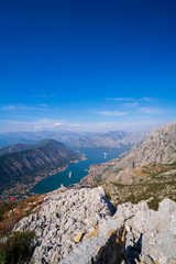 Beautiful landscape view of Bay of Kotor in Montenegro with blue cloudy sky