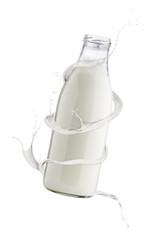 glass bottle full of milk with milk waves splash around, isolated on white.