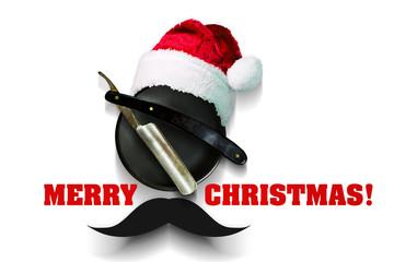 Razor on a plate for foam with a Santa Claus hat on a white background. Inscription Merry...