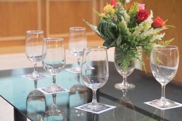 Empty wine glass on the banquet table.