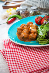 Moroccan Meatballs Served With Semolina and Vegetables