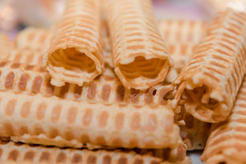 Waffles background. Waffles texture. A lot of waffles on the table. Homemade food. Natural food.