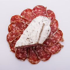 Saucisson sec delicious french salami on a white background