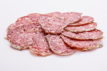 Saucisson sec delicious french salami on a white background