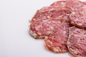 Saucisson sec delicious french salami on a white background