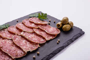 Saucisson sec delicious french salami on a white background