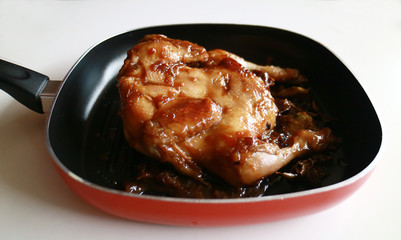 Ayam ungkep. Chicken is cooked in spices prior to deep frying. Can be grilled too. Popular dish in Indonesia.