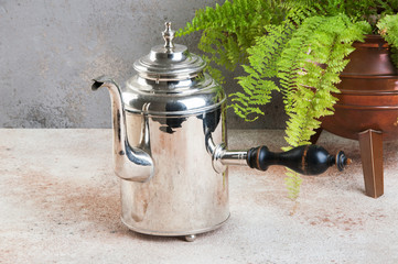 Vintage silver kettle with wooden handle