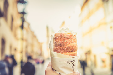 Popular street food in Prague - traditional Czech sweet treat Trdelnik, Czech Republic