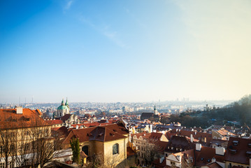 Fototapeta na wymiar View on Prague panorama with red roofs and historic architecture from staromestska radnice, Old Town Hall, Czech Republic