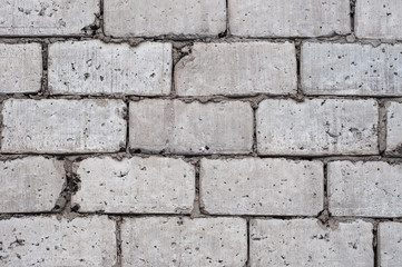 gray wall of large concrete blocks, background, texture