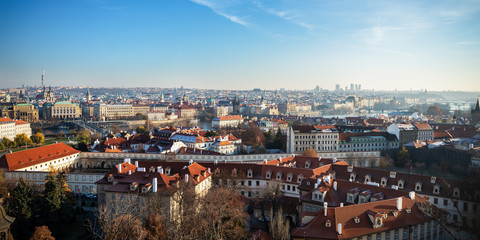 View on Prague panorama with red roofs and historic architecture from staromestska radnice, Old Town Hall, Czech Republic