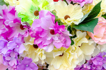 Colorful of fake flowers background