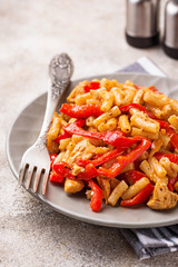 Pasta with chicken and pepper in tomato sauce