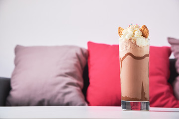 Fototapeta na wymiar Cold chocolate milkshake frappe in glass
