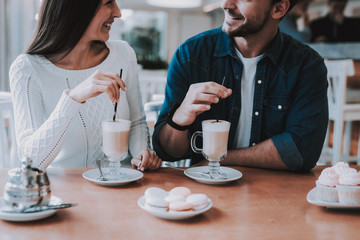 Young Couple is Resting in Cafe