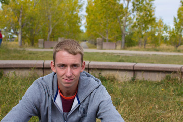 Young man looking unimpressed