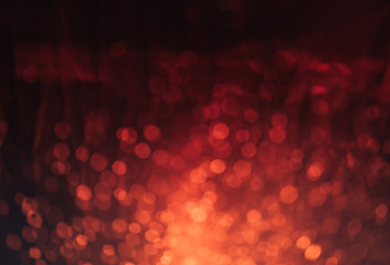 red bokeh abstract backgrounds. image is blurred and filtered.