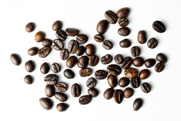 Pile of coffee beans isolated top viwe on white background. clipping path.