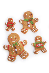 Gingerbread men cookies  isolated on white background with selective focus. Christmas background
