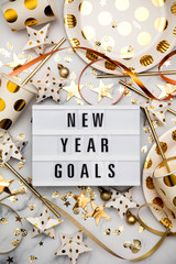 New year goals lightbox celebration message with luxury gold party decorations