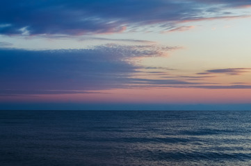 Naklejka na ściany i meble Morning sunrise on the horizon of Aegean sea.