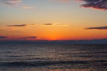 Morning sunrise on the horizon of Aegean sea.