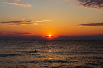 Colorful sunrise sunset above the Aegean sea.