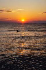 Colorful sunrise sunset above the Aegean sea.