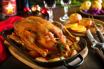 Roast Christmas duck with apples