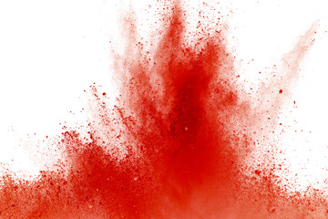 Freeze motion of red powder exploding, isolated on white background. Abstract design of red dust cloud. Particles explosion screen saver, wallpaper