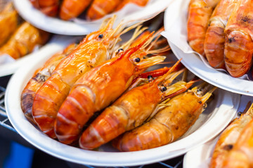 Grilled shrimps seafood on the table in market of Bangkok Thailand 