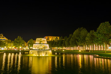 Germany, Illuminated fountain in Wiesbaden city park in the night