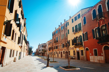 Beautiful street with old buildings in Burano, near Venice, Italy