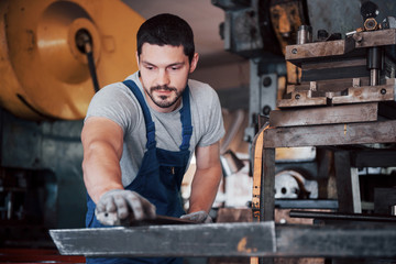 Experienced operator in a hard hat. Metalworking industry concept professional engineer metalworker...