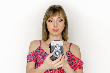 Portrait smiling young woman fashion look pretty cool model with retro film camera wearing elegant...